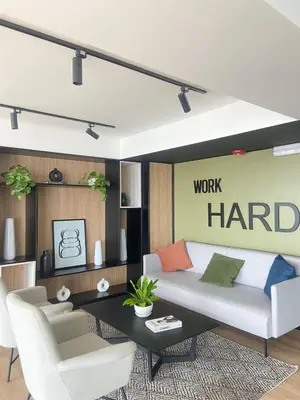 a living room with a white couch and chairs at Departamento de estreno en San Isidro in Lima