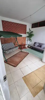 a living room with a couch and a table at Curazao in Punta Hermosa