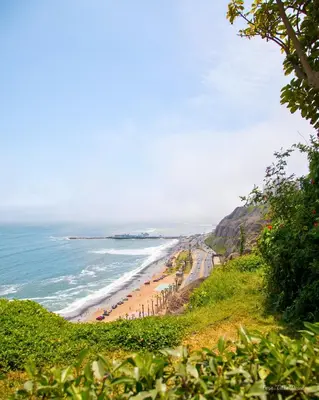 a view of a beach from a hill with the ocean at Casa Villa Descanso in Lima
