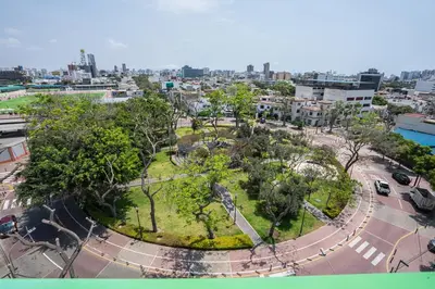 an aerial view of a park in a city at Plaza 27 by Geko in Lima