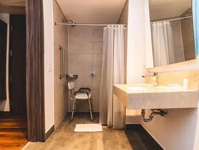 a bathroom with a sink and a shower at Hampton By Hilton Cusco in Cusco
