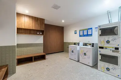 a laundry room with washers and dryers at Apartamento en Miraflores in Lima