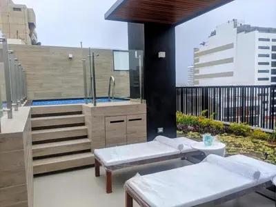 a bathroom with a sink and a tub on a building at Stay, explore and enjoy Lima in Lima