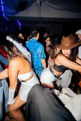 a group of people dancing in a party at PARTY HOSTEL THAY Miraflores Lima in Lima