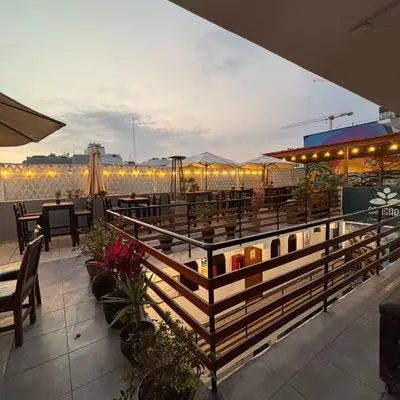 a restaurant with a boat on the roof at PARTY HOSTEL THAY Miraflores Lima in Lima
