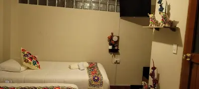 a small room with a bed at Oasis Inka Machupicchu in Machu Picchu