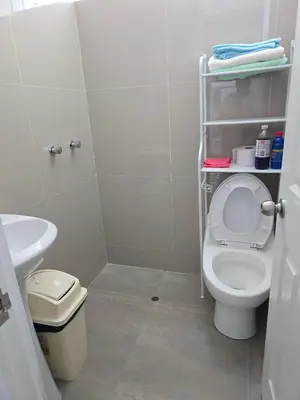 a small bathroom with a toilet and a sink at 401 Moderno departamento equipado in Abancay