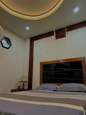 a bedroom with a large bed with a round ceiling at Habitación premium y moderna in La Merced