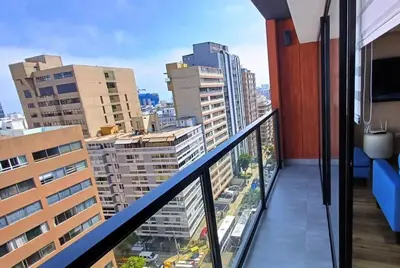a balcony with a view of a city at Apartment in Miraflores - Lima in Lima