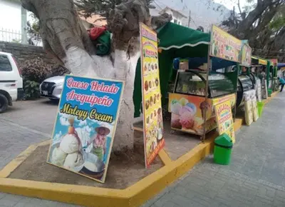 a food stand with signs on the side of a street at Casa de Campo en Santa Eulalia in Santa Eulalia