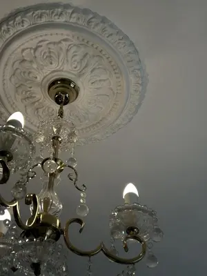 a chandelier is hanging from a ceiling at Kontiki Miraflores in Lima