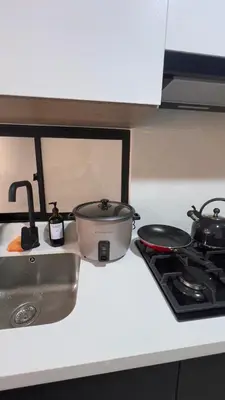 a pot sitting on a counter next to a stove at Miraflores Deluxe in Lima