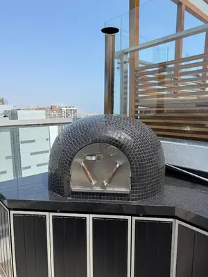 a tire sitting on top of a table on a balcony at New apartment in Barranco in Lima