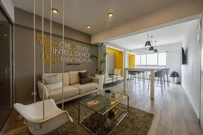 a living room with a couch and a table at New apartment in Barranco in Lima