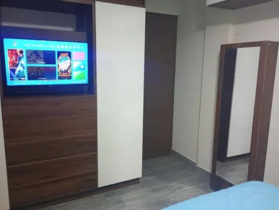a room with a flat screen tv on a wall at Apartamento 3D de estreno muy céntrico in Lima