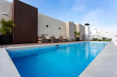 a swimming pool on top of a building at Brand-new designer apt - Pool in Miraflores in Lima