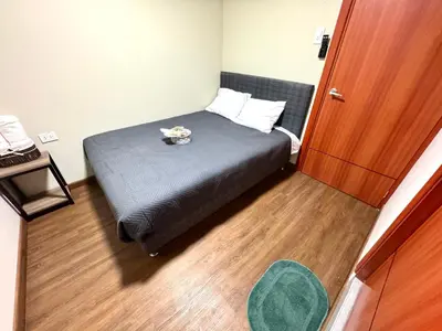 a bedroom with a bed with a bowl of food on it at Casa Cusco in Cusco