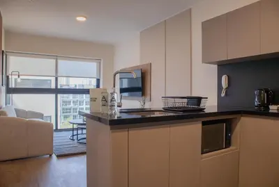 a kitchen with a sink and a counter top at Salaverry by Wynwood House in Lima