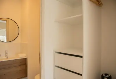 a small bathroom with a sink and a mirror at Salaverry by Wynwood House in Lima