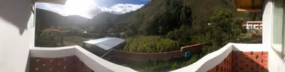 a view of a mountain from a room with a view at Casa de Marguito in Urubamba