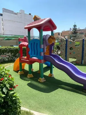 a playground with a slide in a park at Departamento con vistas al mar - Costa Lounge in Lima