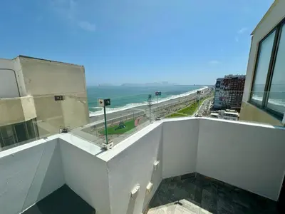 a view of the ocean from a building at Departamento con vistas al mar - Costa Lounge in Lima