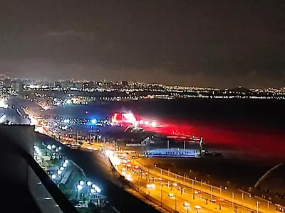 a view of a city at night with lights at Departamento Costa Verde San M in Lima