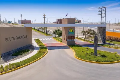 an empty road in front of a gas station at Tiny House con Piscina Privada, AC and Starlink in Paracas