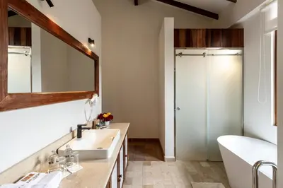 a bathroom with a sink and a mirror at Casa Eva Hotel Boutique in Urubamba