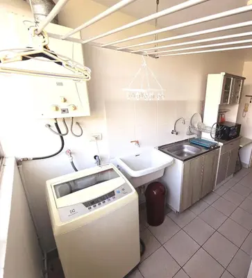 a small kitchen with a sink and a sink at Apartamento Premium frente a Universidad San Marcos para 4 pers en lima in Lima