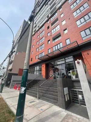 a building with a staircase in front of a building at departamento nuevo con espectacular vista entre surco y Miraflores in Lima