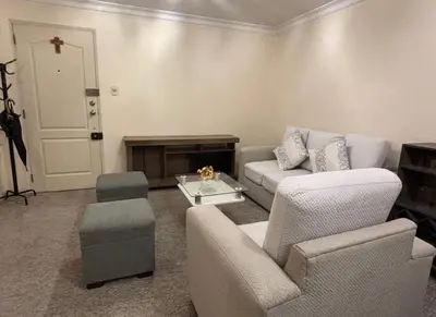 a living room with a couch and a chair at Apartment in cusco center in Cusco