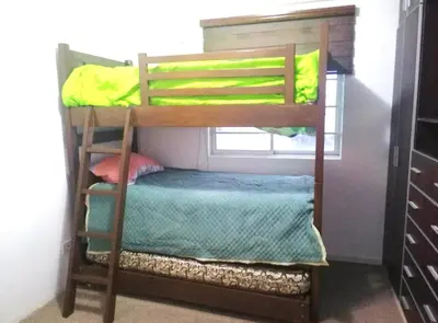 a bunk bed in a room with a bunk bed in a room at Apartment in cusco center in Cusco