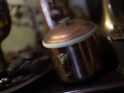 a cup of coffee sitting on top of a stove at Casa Falleri Boutique Hotel in Lima