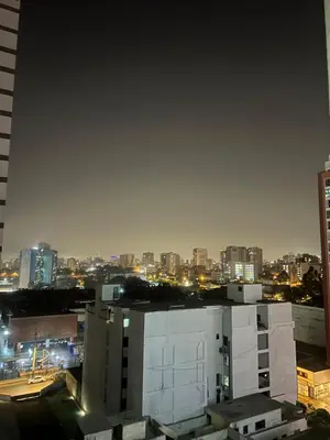 a view of a city skyline at night at Apartamento en Santa Beatriz in Lima