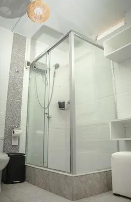 a shower with a glass door in a bathroom at Lovely Apartment-Punta Hermosa in Punta Hermosa