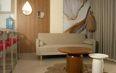 a living room with a couch and a table at Lovely Apartment-Punta Hermosa in Punta Hermosa