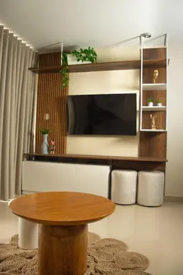 a living room with a table and a tv at Lovely Apartment-Punta Hermosa in Punta Hermosa