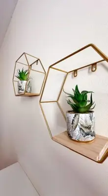 two mirrors on a wall with a plant on a shelf at Lovely Apartment-Punta Hermosa in Punta Hermosa