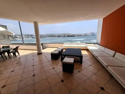 a large room with a view of the ocean at Casa 4 DORM - 3 VISTAMAR, 14 a 20 pax piscina propia in San Bartolo