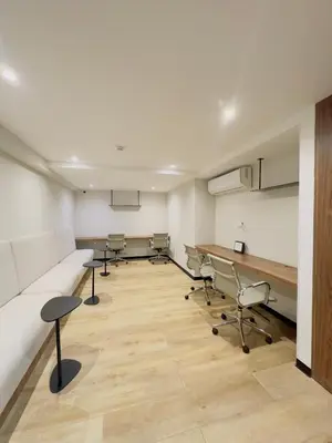 a room with chairs and a couch and a desk at APPARTEMENT CHIC MIRAFLORES Paradis in Lima