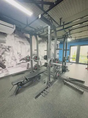 a gym with a bunch of equipment in a room at APPARTEMENT CHIC MIRAFLORES Paradis in Lima