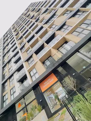 a tall apartment building with a lot of windows at APPARTEMENT CHIC MIRAFLORES Paradis in Lima
