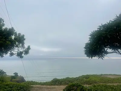 a view of the ocean from a hill at Quiet room in Lima