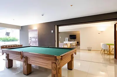 a living room with a pool table in it at Apartment in the most touristy area of Miraflores in Lima