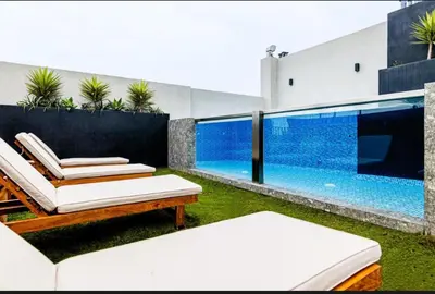 an image of a swimming pool in a house at Premium Miraflores Stay with Pool and Amenities in Lima