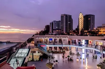 a view of a shopping mall in a city at night at Cosy place retreat Miraflores 3BR in Lima