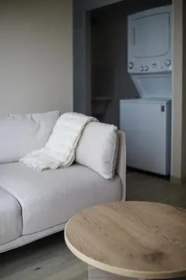 a living room with a couch and a table at Lovely apartment in Lima