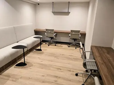 a room with a couch and two chairs and a table at New 1st Fl Executive Patio Pad in Lima