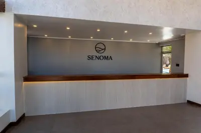 a reception lobby of a senryuoya office building at Senoma Hotel - Adults only in Ica